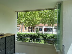 Cerramiento de terraza con cortina de vidrio